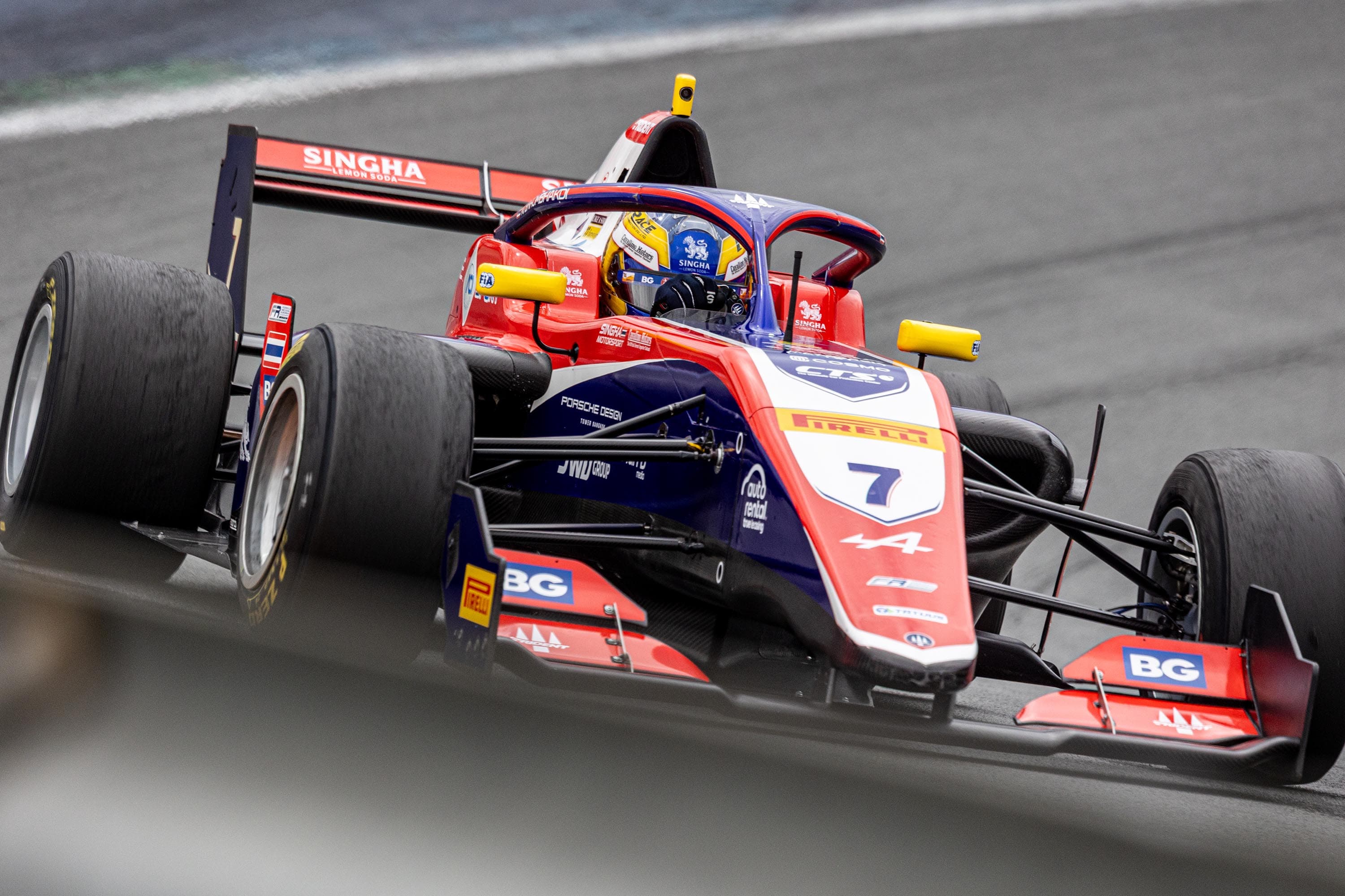 Formula car leaning into a corner
